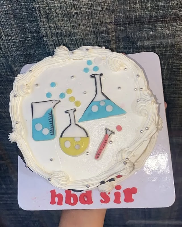 Birthday chemistry theme cake for teacher with scientific designs and vanilla flavor - Themed Birthday Cakes Karachi By Whisk And Sift